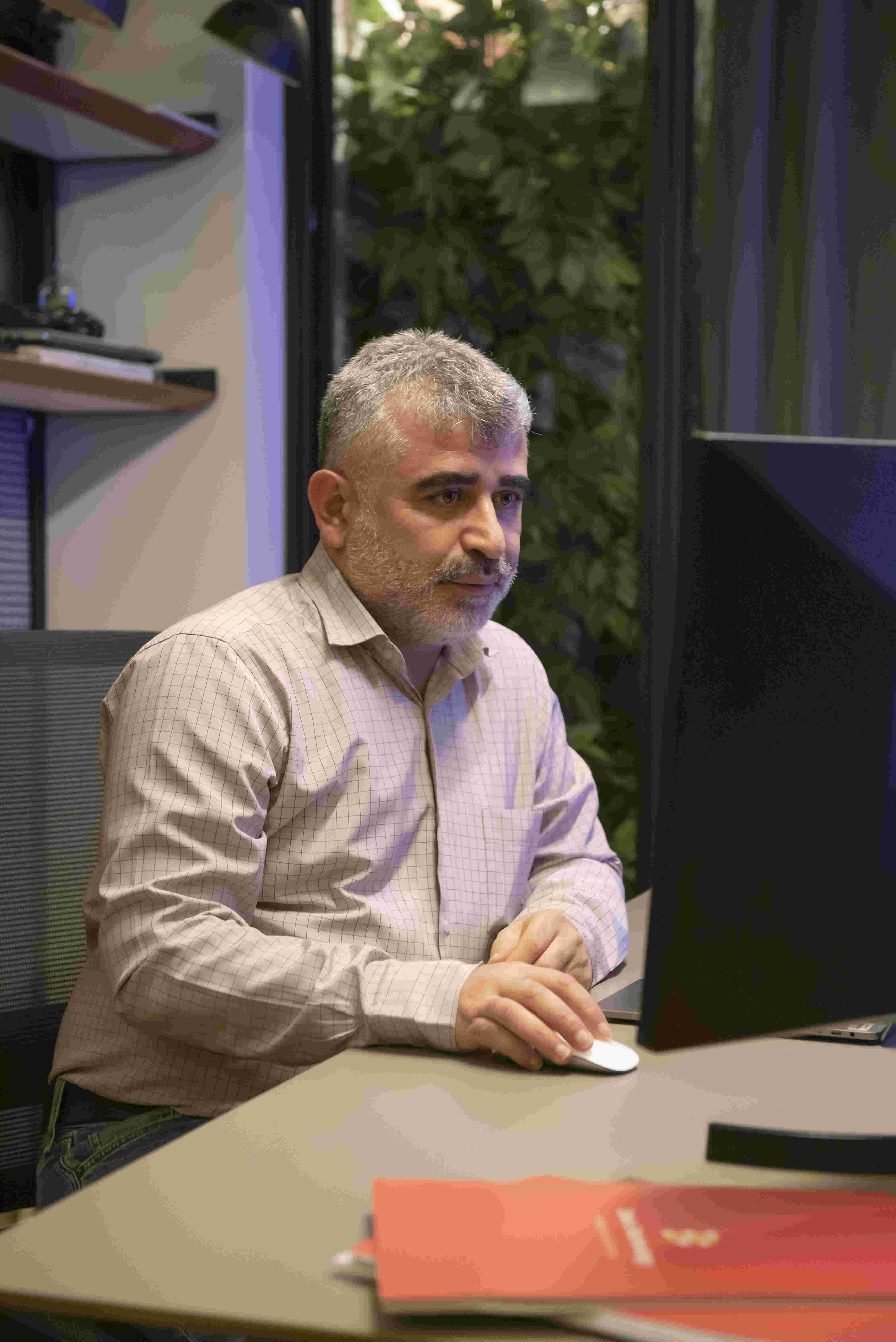 Deka Technology executive at desk
